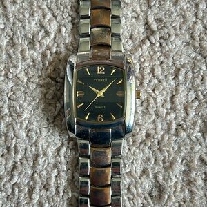Sterner women’s vintage two tone silver/bronze band with gold/black watch face
